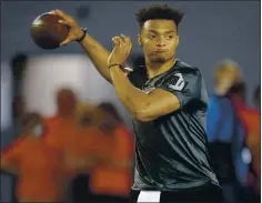  ?? PAUL VERNON — THE ASSOCIATED PRESS ?? Ohio State quarterbac­k Justin Fields informed prospectiv­e NFL teams he is managing epilepsy, but doctors expect him to outgrow the condition.