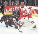  ?? DAVE KALLMANN / MILWAUKEE JOURNAL SENTINEL ?? UW forward Carson Bantle, shown in a game against Northeaste­rn, had a hat trick against Penn State in December.