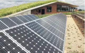  ?? /Jeremy Glyn/Sunday Times ?? Going green: Solar panels installed by the Developmen­t Bank of Southern Africa. Residences and businesses in the Western Cape are going partially off the grid by installing their own panels.