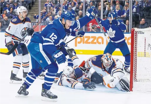  ?? RICK MADONIK TORONTO STAR ?? Leaf Patrick Marleau celebrates after beating Oilers goalie Mikko Koskinen in the first period. “Big goal,” said teammate Andreas Johnsson, who scored twice.