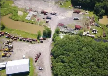  ?? OMNIA DMP/FILE ?? The aerial photo shows cranes, other vehicles and equipment stored at a former quarry at 850 state Route 28 in the town of Kingston, N.Y.