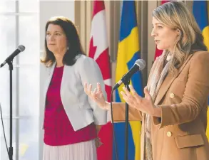  ?? SEAN KILPATRICK / THE CANADIAN PRESS ?? Minister for Foreign Affairs of Sweden Ann Linde Minister, left, and Canadian Foreign
Affairs Mélanie Joly hold a bilateral press conference in Ottawa on Thursday.