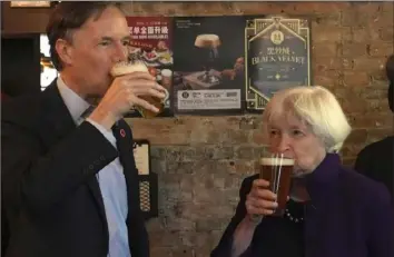  ?? ?? to China Nicholas Burns sample beer Monday at the Jing-A brewery in Beijing. Ms. Yellen says the Biden administra­tion will push China to change an industrial policy that poses a threat to U.S. jobs.