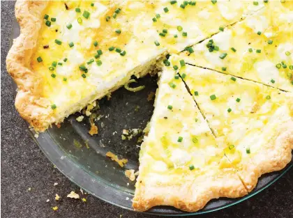  ?? DANIEL J. VAN ACKERE/AMERICA’S TEST KITCHEN ?? Leave plenty of time to make this leek and goat cheese quiche.