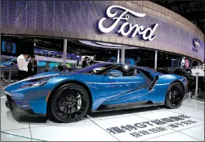  ?? AP/NG HAN GUAN ?? A 2017 Ford GT is displayed at the Auto Shanghai 2017 show at China’s National Exhibition and Convention Center in April. Ford’s second-quarter profit rose 4 percent to $2 billion, the company reported Wednesday.