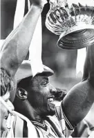  ?? ?? ■ Cyrille Regis of Coventry holds the FA Cup aloft in 1987; can there be a repeat?