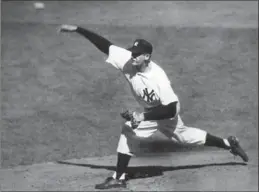  ?? ASSOCIATED PRESS FILE PHOTO ?? Don Larsen pitches en route to a perfect game in the fourth inning of Game 5 of the World Series in New York on Oct. 8, 1956.