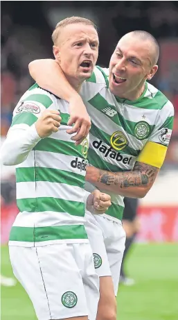  ?? SNS. ?? Scott Brown, right, admires the decision by Celtic team-mate Leigh Griffiths to sit out Scotland duty to work on fitness.