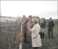  ?? Ben Lambert / Hearst Connecticu­t Media ?? U.S. Rep. Elizabeth Esty, D-Conn., Mayor Elinor Carbone, Col. Bill Conde and other officials visited the Naugatuck River Tuesday to discuss the status of Torrington's efforts to restore its flood-protection system.