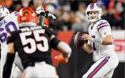  ?? Emilee Chinn / Associated Press ?? Bills quarterbac­k Josh Allen said, “The more struggle, the more adversity that you can see over the course of the year, it just makes you stronger.” Buffalo has seen its share, the latest being Damar Hamlin’s cardiac arrest.