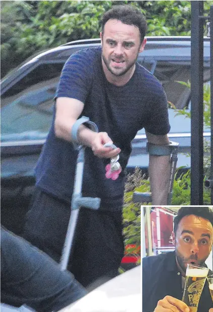  ??  ?? Ant McPartlin was clearly struggling last week when he was spotted out on crutches. He and Dec, right, were regulars at bars in Chiswick