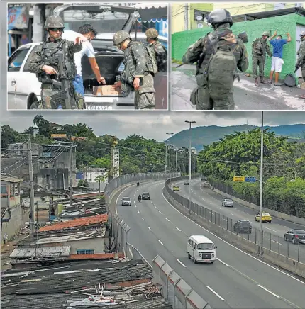  ??  ?? VIGILANCIA. Un militar observa la ciudad desde las alturas de la Rocinha, una de las favelas más grandes de Río de Janeiro. Constituci­onalistas alertan sobre el riesgo de violacione­s de los DD.HH.