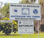  ??  ?? Batchelor’s attraction­s include the Coomalie Cultural Centre (top left) and the Rum Jungle Tavern (top right)