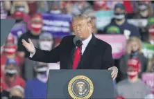  ?? CHARLIE NEIBERGALL — THE ASSOCIATED PRESS ?? President Donald Trump speaks at a campaign rally at Des Moines Internatio­nal Airport, Wednesday, Oct. 14, in Des Moines, Iowa.