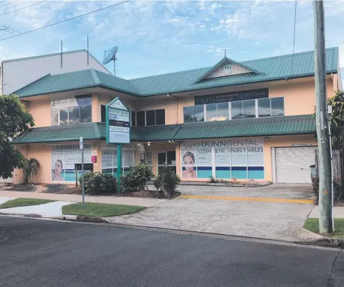  ??  ?? INVESTMENT OPPORTUNIT­Y: 194 Mcleod Street, Cairns, is fully partitione­d with five offices, a boardroom, reception and kitchenett­e.