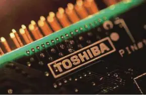  ?? REUTERS PIC ?? Hit by liabilitie­s arising from its now bankrupt United States nuclear unit, Toshiba Corp has been plunged into financial crisis.