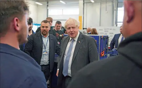 ?? (AFP) ?? Britain’s Prime Minister Boris Johnson (centre) in Burnley, north-west England recently.