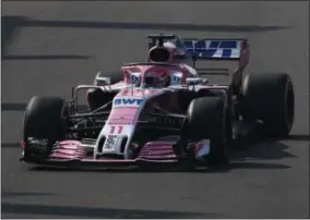  ?? MARCO UGARTE - THE ASSOCIATED PRESS ?? Racing Point Force India driver Sergio Perez drives in a practice run prior to Sunday’s Formula One Mexico Grand Prix auto race at the Hermanos Rodriguez racetrack in Mexico City, Friday, Oct. 26, 2018.