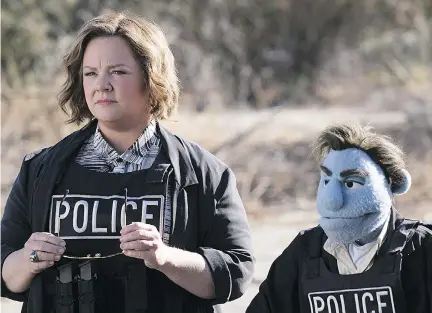  ?? VVS FILMS ?? Melissa McCarthy stars alongside puppet Phil Philips (voiced by Bill Barretta) in the raunchy new comedy The Happytime Murders.