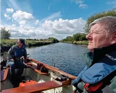  ??  ?? Taking it all in: John Creedon on the River Shannon