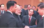  ??  ?? Prime Minister Narendra Modi shakes hand with Chinese President Xi Jinping (right) on the sidelines of the recent G20 summit in Germany.