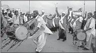  ?? AP/FAREED KHAN ?? People in Karachi, Pakistan, celebrate Saturday ahead of the nation’s Independen­ce Day. Monday marks the 70th year since Pakistan’s independen­ce from British colonial rule.