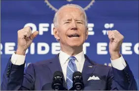  ?? Matt Slocum / Associated Press ?? President-elect Joe Biden speaks about the COVID-19 pandemic during an event at The Queen theater Thursday in Wilmington, Del.