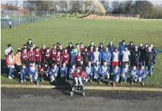  ??  ?? Some of those who took part in a charity football match.