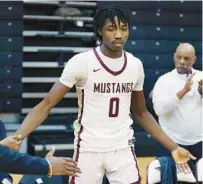  ?? ?? Wekiva’s Malachi Hampton scored 24 points in the Mustangs’ region semifinal victory Tuesday night.