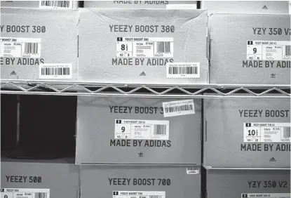  ?? SETH WENIG AP ?? Adidas’ breakup with rapper Ye and the inability to sell his popular Yeezy line of shoes helped batter the company’s earnings.