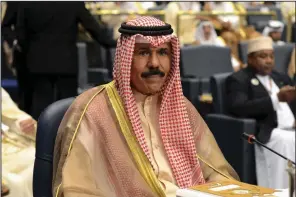  ?? (AP/Nasser Waggi) ?? Kuwait’s then-Crown Prince Sheik Nawaf Al Ahmad Al Jaber Al Sabah attends the closing session of the 25th Arab Summit at Bayan Palace in Kuwait City in March 2014.