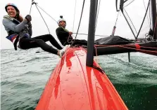  ?? PHOTOS: COURTESY CE C CATAMARAN EUROPE CENTRAL ?? The iFly15, designed for single- or doublehand­ing, is a new addition to the world of small-craft foiling. With demo boats available in Miami this winter, profession­al sailor and Moth devotee Victor Diaz de Leon (above, bottom right) jumped at the chance to try it. His assessment: “Very cool and really easy to fly.”