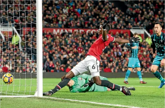  ?? PHOTOS: GETTY IMAGES ?? Paul Pogba ‘scores’ for Manchester United against Southampto­n but the goal was correctly ruled out for offside.