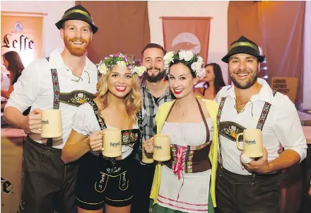  ?? — JONATHAN EVANS ?? Some Bavarian-inspired revelry at last year’s Harvest Haus at Queen Elizabeth Plaza in Vancouver, complete with imported German beer and local strudels.