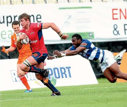  ?? PHOTO: GETTY IMAGES ?? Tasman’s Ethan Blackadder heads for the try line in their Mitre 10 Cup match against Auckland at Trafalgar Park in Nelson yesterday.