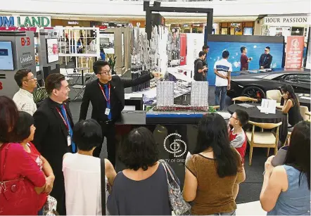  ??  ?? Visitors looking at the City of Dreams project by Ewein Zenith Sdn Bhd during StarProper­ty.my Fair 2017 in April this year at Queensbay Mall, Bayan Lepas, Penang.