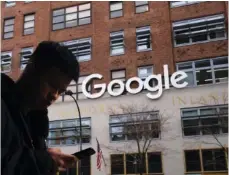  ?? AP PHOTO/MARK LENNIHAN ?? A man walks past Google offices in New York in 2018. Google is closing the studio tasked with developing games for its Stadia cloud-gaming service, a move that raises questions about the future of its Stadia service itself.