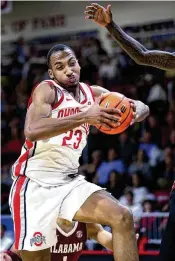  ?? MICHAEL SNYDER / ASSOCIATED PRESS ?? Ohio State’s Zed Key works in the lane against Alabama on Nov. 24. The Buckeyes defeated Miami 84-64 on Wednesday night.