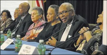  ?? Kelly P. Kissel The Associated Press ?? Surviving members of the Little Rock Nine speak with the media Friday at the Clinton School of Public Service in Little Rock, Ark. From left are Thelma Mothershed Wair, Minnijean Brown Trickey, Terrence J. Roberts, Carlotta Walls LaNier, Gloria Ray...