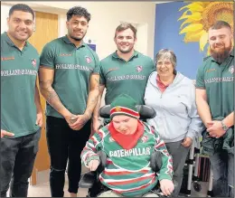  ??  ?? Leicester Tigers stars delighted families and staff at Rainbows Hospice when they popped in for a tour, tea and to sign autographs. Pictures: Jake Pearson, from Burbage (centre) with mum, Sue, and Tigers Sione, Valentino, George and Michele.