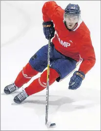  ?? CP PHOTO ?? Edmonton Oilers’ Connor Mcdavid takes part in a drill during the 2018 Biosteel Pro Hockey Camp in Toronto on Monday.