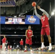  ?? DAVID J. PHILLIP — THE ASSOCIATED PRESS ?? Oklahoma’s Buddy Hield shoots during practice Friday at NRG Stadium in Houston.