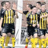  ??  ?? Goalden boys Glenafton scorers Cameron Marlow and Alan Cairns, and above, Talbot celebrate after taking the lead at Rugby Park