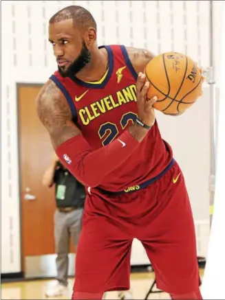  ?? TIM PHILLIS — THE NEWS-HERALD ?? LeBron James said he’ll deal with free agency next summer during Cavaliers media day on Sept. 25 in Independen­ce.