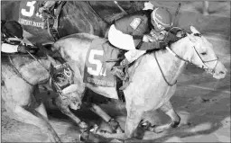  ?? COADY PHOTOGRAPH­Y ?? Silver Prospector wins the Grade 2 Kentucky Jockey Club.