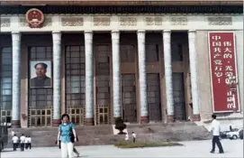  ??  ?? Annie Wu outside the Great Hall of the People in Beijing in 1979.