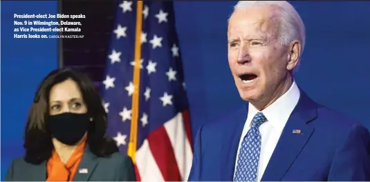  ?? CAROLYN KASTER/AP ?? President-elect Joe Biden speaks Nov. 9 in Wilmington, Delaware, as Vice President-elect Kamala Harris looks on.