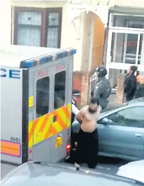  ??  ?? Officers escort a man with a blanket covering his head in Barking, and right, a bare-chested man is led away by police in East Ham, both in east London