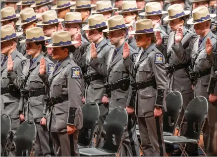  ?? DARREN MCGEE-OFFICE OF GOVERNOR KATHY HOCHUL PHOTO ?? Troopers listen as Gov. Kathy Hochul delivers remarks at NYS Police Graduation Ceremony at the Empire State Plaza Convention Center