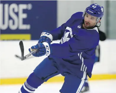  ??  ?? DAVE ABEL / POSTMEDIA NEWS Toronto Maple Leafs centre Nazem Kadri is off to a strong start offensivel­y with 14 points in 17 games, but it’s his defensive play that is drawing raves. With Auston Matthews day-to-day, Kadri will be leaned on more than ever.